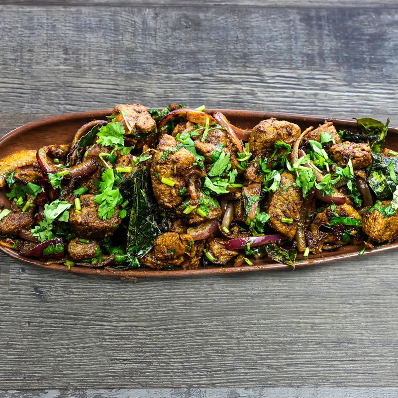 Lamb Pepper Fry with red onion and curry leaves